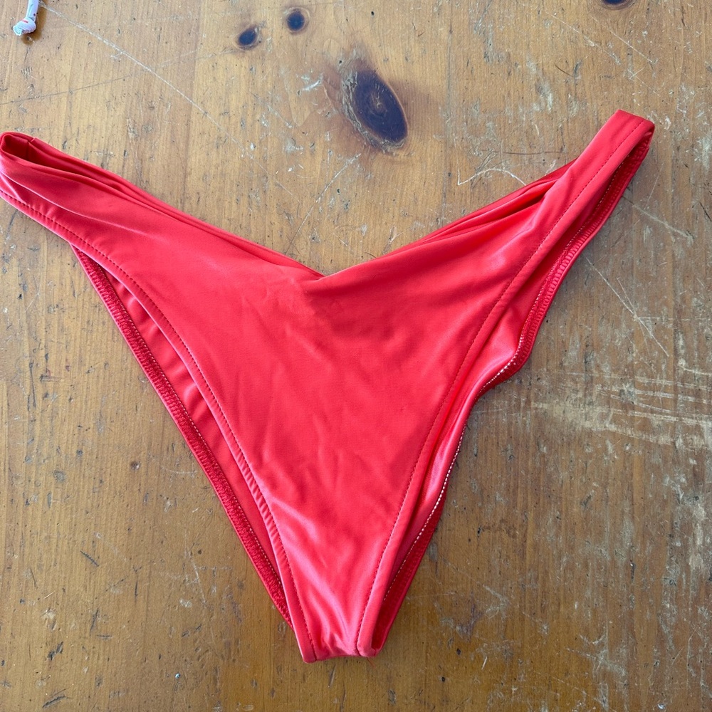 Frankie’s bikini bottom. NEVER WORN!!